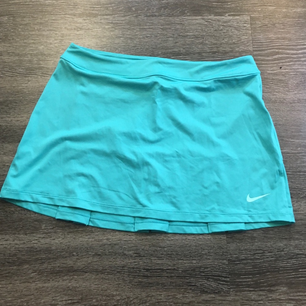 Teal Nike tennis/golf skirt. No undershorts!!
